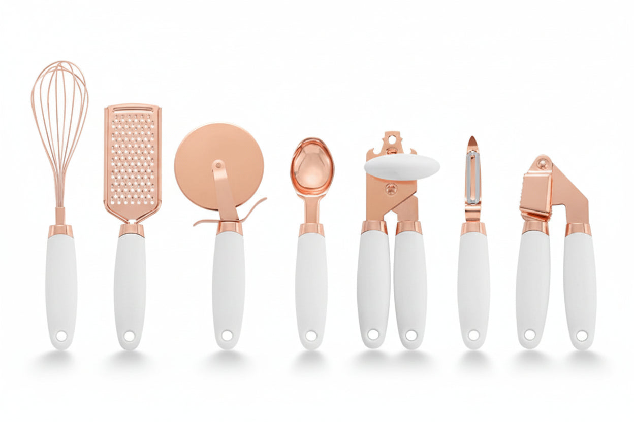 Set of rose gold and white kitchen utensils with measurements on a white background
